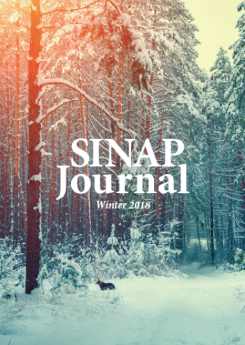 表紙 SINAP Journal Winter 2018 雪が積もった森の写真。一匹の犬が小さく映っている